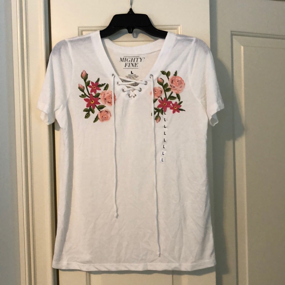 White top with pink floral design